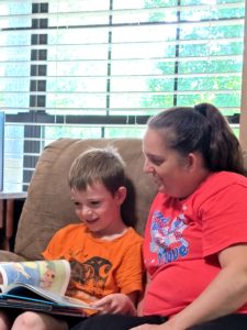 Back Porch Book Chat: Stephenie Pyles reading to a child